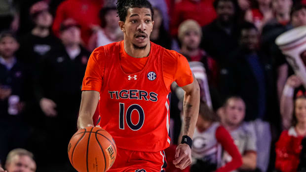 Feb 24, 2024; Athens, Georgia, USA; Auburn Tigers guard Chad Baker-Mazara (10) controls the ball against the Georgia Bulldogs at Stegeman Coliseum. Mandatory Credit: Dale Zanine-USA TODAY Sports